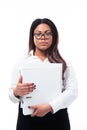 Serious businesswoman standing with folder Royalty Free Stock Photo