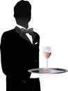 A serious butler, head waiter, or server is serving a glass of wine. Royalty Free Stock Photo