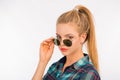 Serious calm confident girl with sunglasses