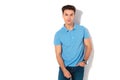 Serious casual man in polo shirt and jeans Royalty Free Stock Photo