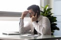 Serious Caucasian businessman talk on cellphone in office Royalty Free Stock Photo