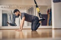 Serious Caucasian male athlete doing a strength exercise Royalty Free Stock Photo