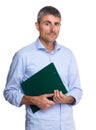 Serious caucasian old man holding clipboard Royalty Free Stock Photo