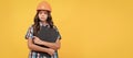 serious child in construction helmet hold in clipboard, expertise. Child builder in helmet horizontal poster design