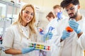 Serious clinicians studying chemical elements in laboratory Royalty Free Stock Photo