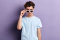 Serious confident fashion guy looking at the camera Royalty Free Stock Photo