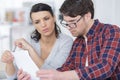 serious couple looking at paperwork together Royalty Free Stock Photo