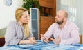 Serious couple talking in home Royalty Free Stock Photo