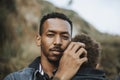 Serious dad with his son outdoors Royalty Free Stock Photo