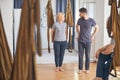 Barefoot trainer working with his female client