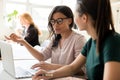 Serious diverse business team members discussing startup project Royalty Free Stock Photo