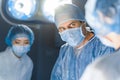 Serious doctor in operating theatre