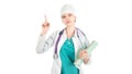 Serious doctor in white uniform with stethoscope, with notebook in hand keeps her finger up. Attention sign