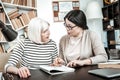 Serious elderly student being in all ears Royalty Free Stock Photo