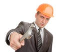 Serious engineer in hardhat with spanner