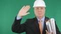 Serious Engineer Make Salute Gestures with Green Screen in Background
