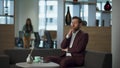 Serious entrepreneur thinking business work on comfortable sofa. Man working Royalty Free Stock Photo