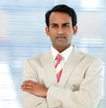 Serious ethnic businessman with folded arms Royalty Free Stock Photo