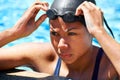 Serious, face and woman swimming with goggles for challenge, underwater sports and training. Swimmer, pool and thinking Royalty Free Stock Photo