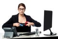 Serious faced woman cutting her credit card Royalty Free Stock Photo