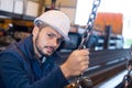 serious factory worker looking at camera Royalty Free Stock Photo