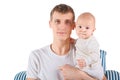 Serious father with baby is sitting on chair