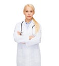 Serious female doctor with stethoscope Royalty Free Stock Photo