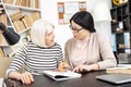 Serious female tutor explaining mistake Royalty Free Stock Photo