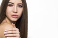 Serious girl touching her shoulder Royalty Free Stock Photo