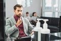 Serious guy thinking about new haircut