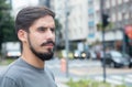 Serious hispanic guy with beard