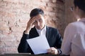 Serious HR manager interviewing young woman student Royalty Free Stock Photo