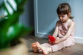 Serious little girl with mobile phone Royalty Free Stock Photo