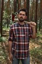 Serious Lumberjack in a Forest