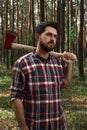 Serious Lumberjack in a Wood