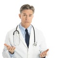 Serious Male Doctor Gesturing Against White Background