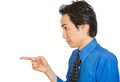 Serious man, pointing with index finger at someone Royalty Free Stock Photo