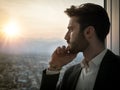 Serious man standing inside modern building Royalty Free Stock Photo