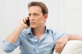 Serious Man Talking On Phone Royalty Free Stock Photo