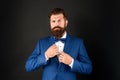 serious man in tuxedo neck tie. man in formalwear on black background. male formal fashion