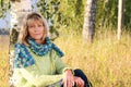 Serious mature woman relaxing in nature Royalty Free Stock Photo