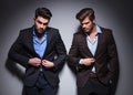 Serious men posing in studio Royalty Free Stock Photo