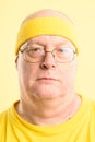 serious man portrait real people high definition yellow background Royalty Free Stock Photo