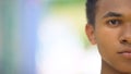 Serious mixed-race teen male looking on camera, fears and bullying problems Royalty Free Stock Photo