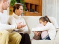 Serious parents scolding daughter Royalty Free Stock Photo
