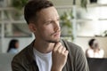 Serious pensive young man, businessman looking at window away Royalty Free Stock Photo