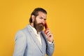 serious phone call. communication concept. brutal handsome man with moustache speak on phone. call and conversation Royalty Free Stock Photo