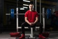 Serious Powerlifter Standing in the Gym