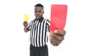 Serious referee showing yellow and red card Royalty Free Stock Photo