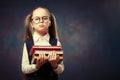 Serious Schoolgirl Wear Glasses Hold Pile of Book. Color Tone